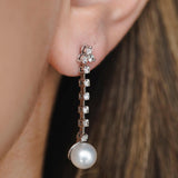 עגילי יהלומים נופלים ופנינה זהב לבן