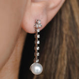 עגילי יהלומים נופלים ופנינה זהב לבן